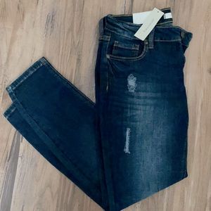 Francesca’s Dark Washed Jeans.